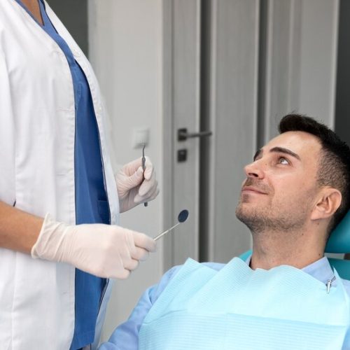 dentist-doing-check-up-patient_23-2149206219